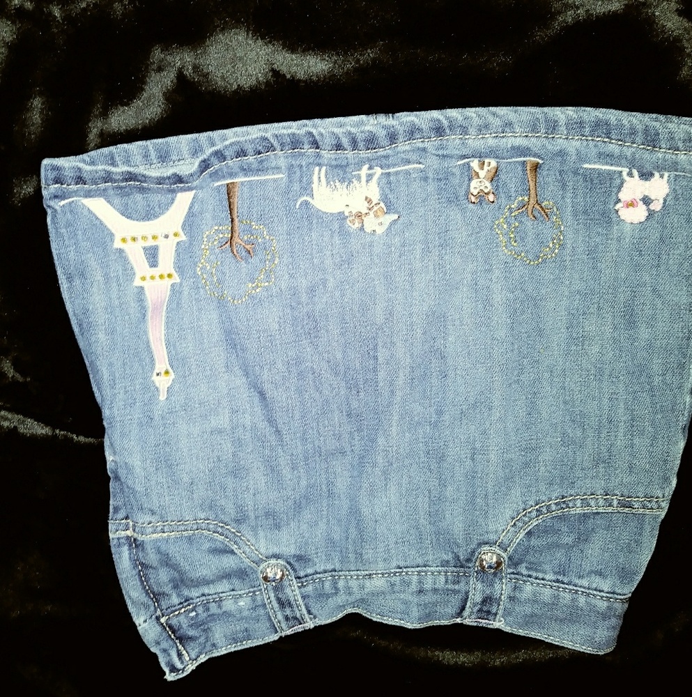 Young girls skirt with attached shorts underneath.